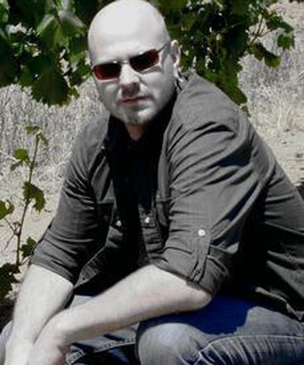Winemaker Tim Drake is sitting somewhere on the grape farm.